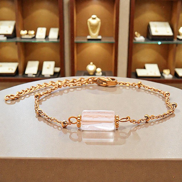 Bracelet Cristal de roche LINE® en pierre blanche tube facettée sur chaîne dorée