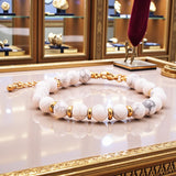 Bracelet Howlite blanche AURA® – perles 6 mm en pierre naturelle & dorée