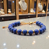 Bracelet Lapis Lazuli AURA® – perles 6 mm en pierre naturelle & dorée