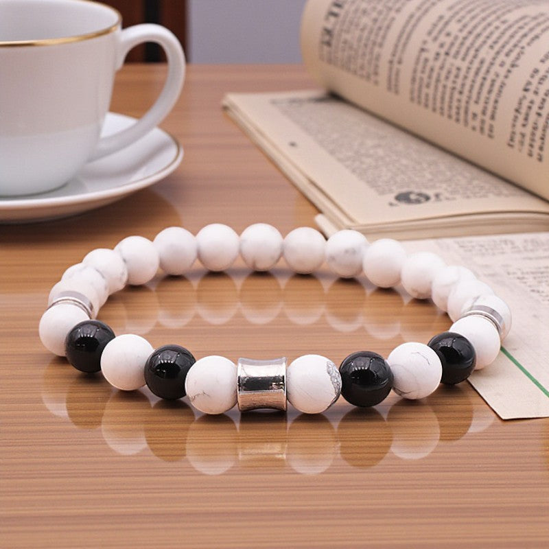 Bijou homme en pierres naturelles onyx noir et howlite blanche, style sobre et spirituel