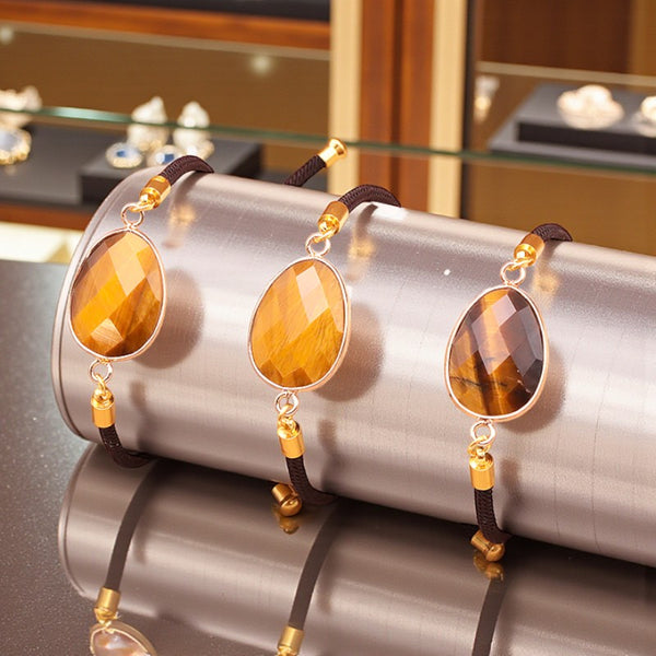 Bracelet Œil de tigre ÉCLIPSE® avec pierre naturelle ovale facettée sur cordon réglable