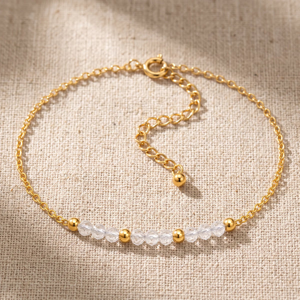 Bracelet pierre naturelle blanche FILÉA®, perles de cristal de roche facettées sur chaîne fine dorée