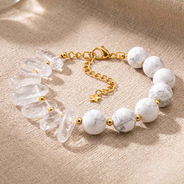Bracelet pierre naturelle blanche DUALIA® en cristal de roche et howlite blanche, chaîne dorée réglable