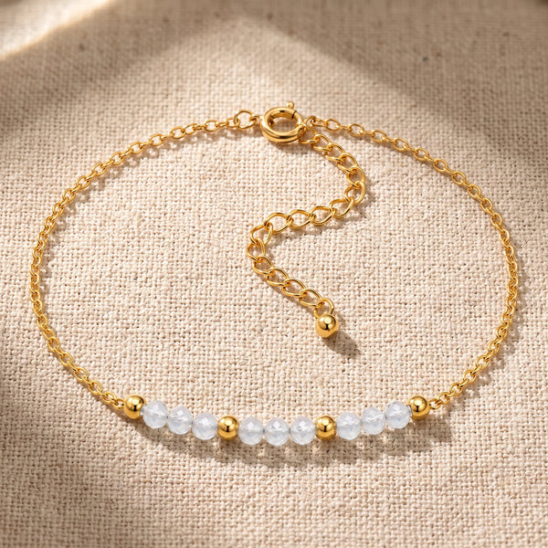 Bracelet pierre naturelle bleue FILÉA®, perles d'aigue-marine facettées sur chaîne fine dorée