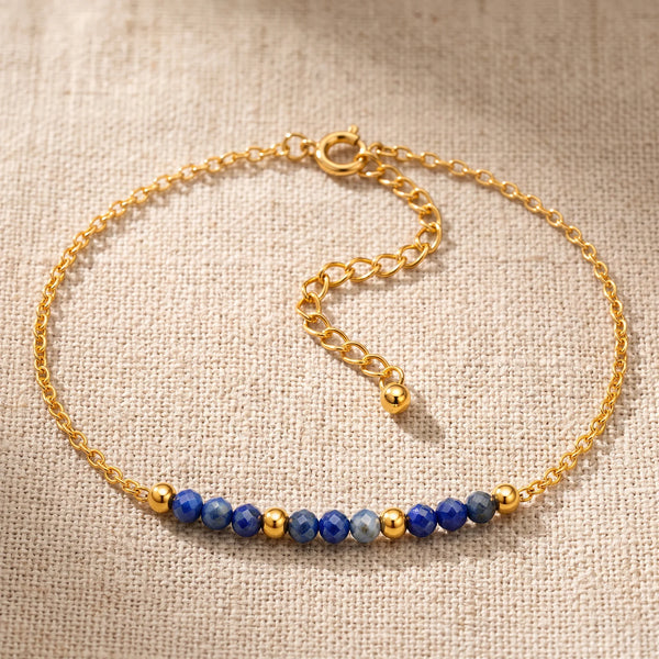 Bracelet pierre naturelle bleue FILÉA®, perles de lapis-lazuli facettées sur chaîne fine dorée
