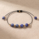 Bracelet Sodalite ALTÉA®, Pierre Bleue sur Cordon Coulissant Noir et Doré
