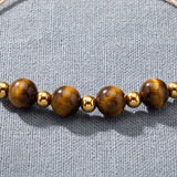Bracelet Œil de Tigre Femme ALTÉA®, Cordon Coulissant Beige et Perles Dorées