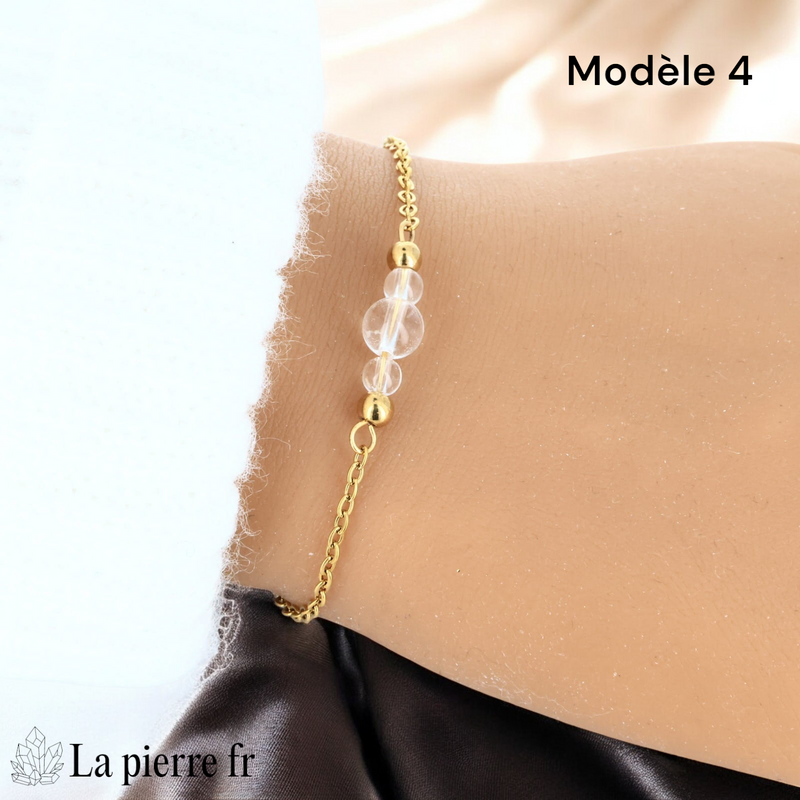 Bracelet cristal de roche perle centrale 6 mm encadrée de deux perles 4 mm