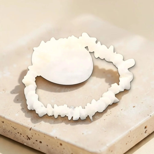 Photo réelle du bracelet en pierre de lune et de sa pierre roulée blanche laiteuse