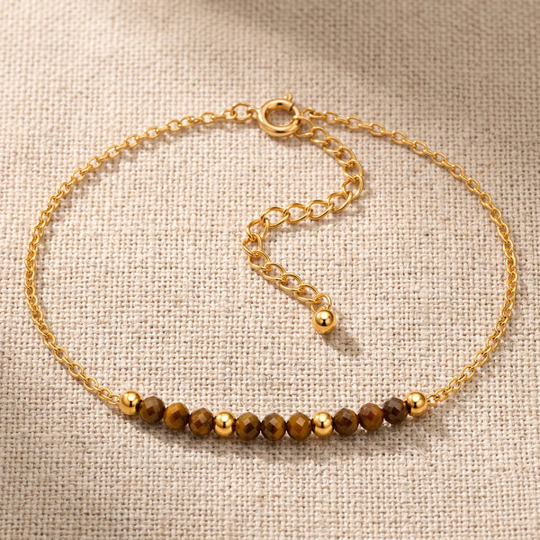 Bracelet pierre naturelle marron FILÉA®, perles d'œil de tigre facettées sur chaîne fine dorée