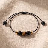 Bracelet Œil de Tigre et Pierre de Lave LAVIA®, Cordon Coulissant Noir