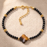 Bracelet Trèfle 4 Feuilles TRÉFLIA®, Œil de Tigre et Onyx Noir, Chaîne Dorée