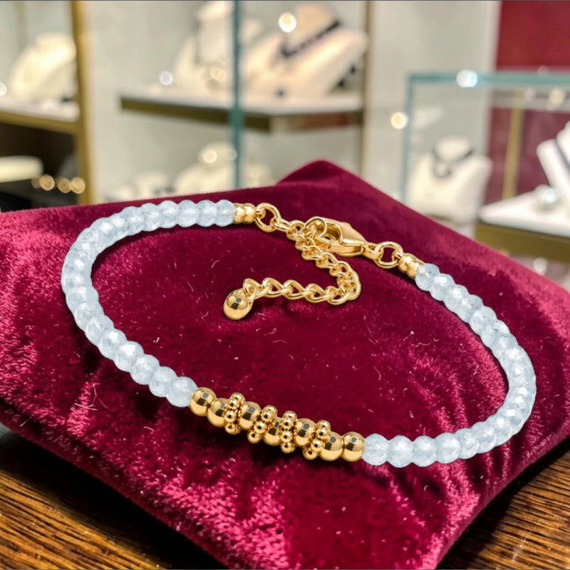 Bracelet fin en Aigue-marine FINA®, perles facettées et acier doré