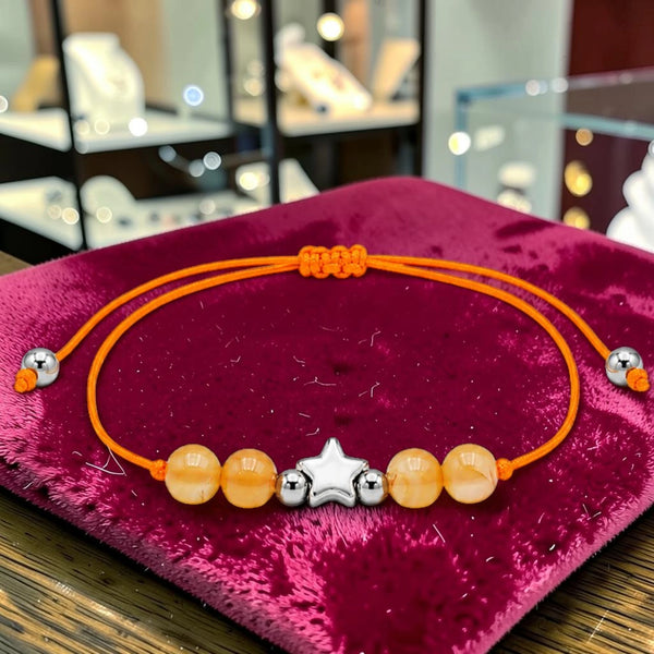 Bracelet pierre naturelle cornaline femme ÉTOILE®, perles 6 mm sur cordon orange coulissant et étoile argentée