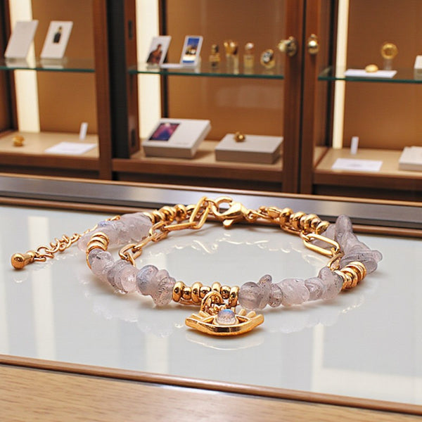 Bracelet pierre naturelle labradorite mauvais œil OCULUS®, double rang doré avec pierres chips et breloque œil