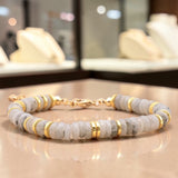 Bracelet perles plates en Labradorite DISQUE®, acier doré