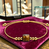 Bracelet cordon doré en Œil de tigre CUBE®, pierre cube 8 mm
