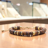 Bracelet perles plates en Œil de tigre DISQUE®, acier doré