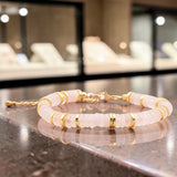 Bracelet perles plates en Quartz rose DISQUE®, acier doré