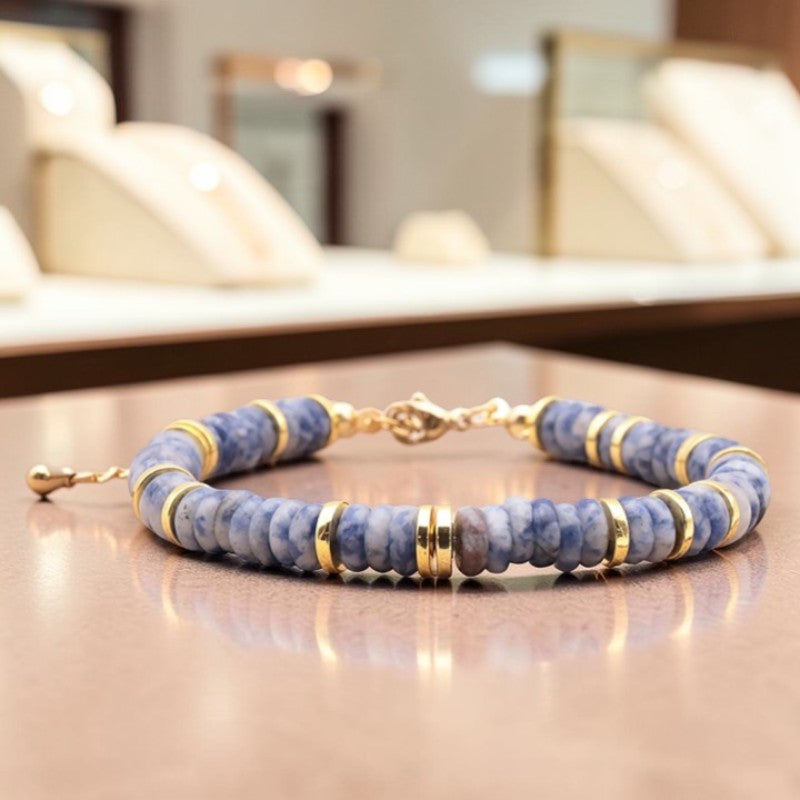 Bracelet perles plates en Sodalite DISQUE®, acier doré