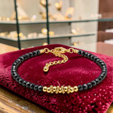 Bracelet fin en Spinelle noir FINA®, perles facettées et acier doré