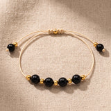 Bracelet Obsidienne Noire ALTÉA®, Pierre Noire sur Cordon Coulissant Doré