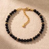 Bracelet Onyx Femme ORÉLIA®, Perles Noires 4 mm et Rondelles Dorées