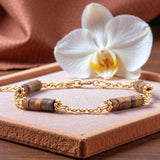 Bracelet heishi en Œil de tigre QUATUOR®, acier doré
