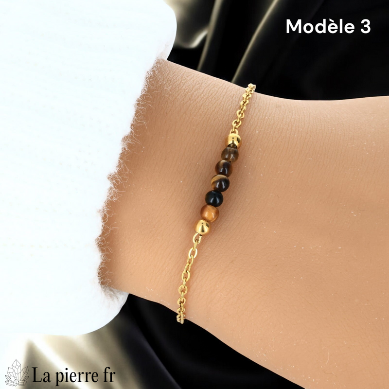 Bracelet œil de tigre modèle cinq perles de 4 mm sur chaîne fine dorée