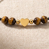 Bracelet Œil de Tigre CÂLINE®, Cœur Doré et Cordon Coulissant Noir