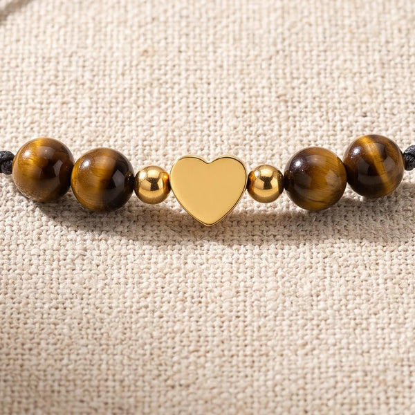 Gros plan sur les perles du bracelet porte bonheur femme CÂLINE®