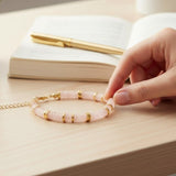 Bracelet perles plates en Quartz rose DISQUE®, acier doré