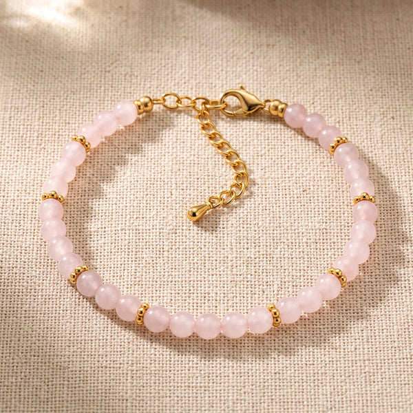 Bracelet pierre naturelle rose ORÉLIA® en perles de quartz rose de 4 mm, rondelles fleurs dorées