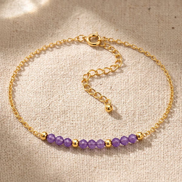 Bracelet pierre naturelle violette FILÉA®, perles d'améthyste facettées sur chaîne fine dorée