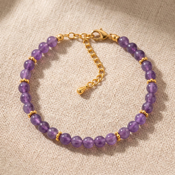 Bracelet pierre naturelle violette ORÉLIA® en perles d'améthyste de 4 mm, rondelles fleurs dorées