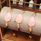 Bracelet Quartz rose ÉCLIPSE® – pierre naturelle ovale facettée sur cordon réglable