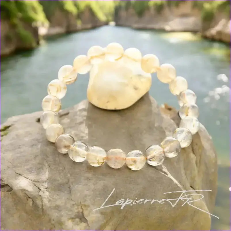 Bracelet sur mesure en perles rondes de Quartz Rutile naturel 8mm avec inclusions dorées