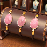 Bracelet Rhodonite ÉCLIPSE® – pierre naturelle ovale facettée sur cordon réglable