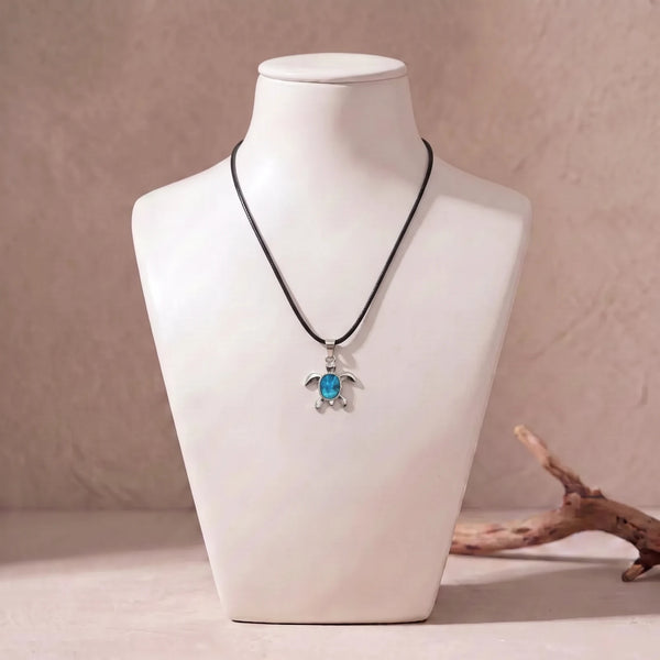 Collier tortue en nacre sur cordon ciré noir, pendentif bleu en nacre d'ormeau