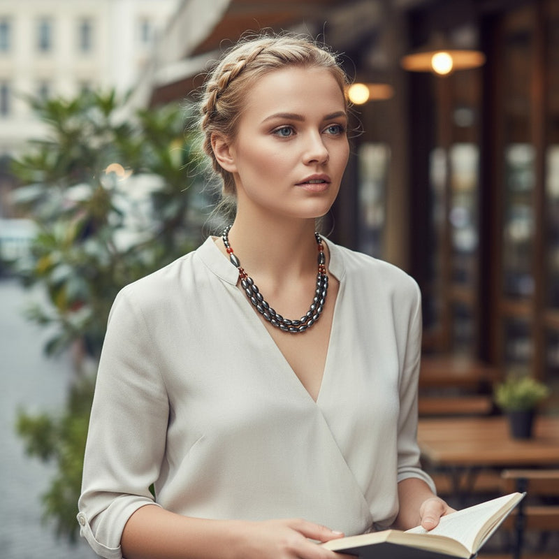 Collier 60 cm en perles olive d'hématite et cornaline orangée