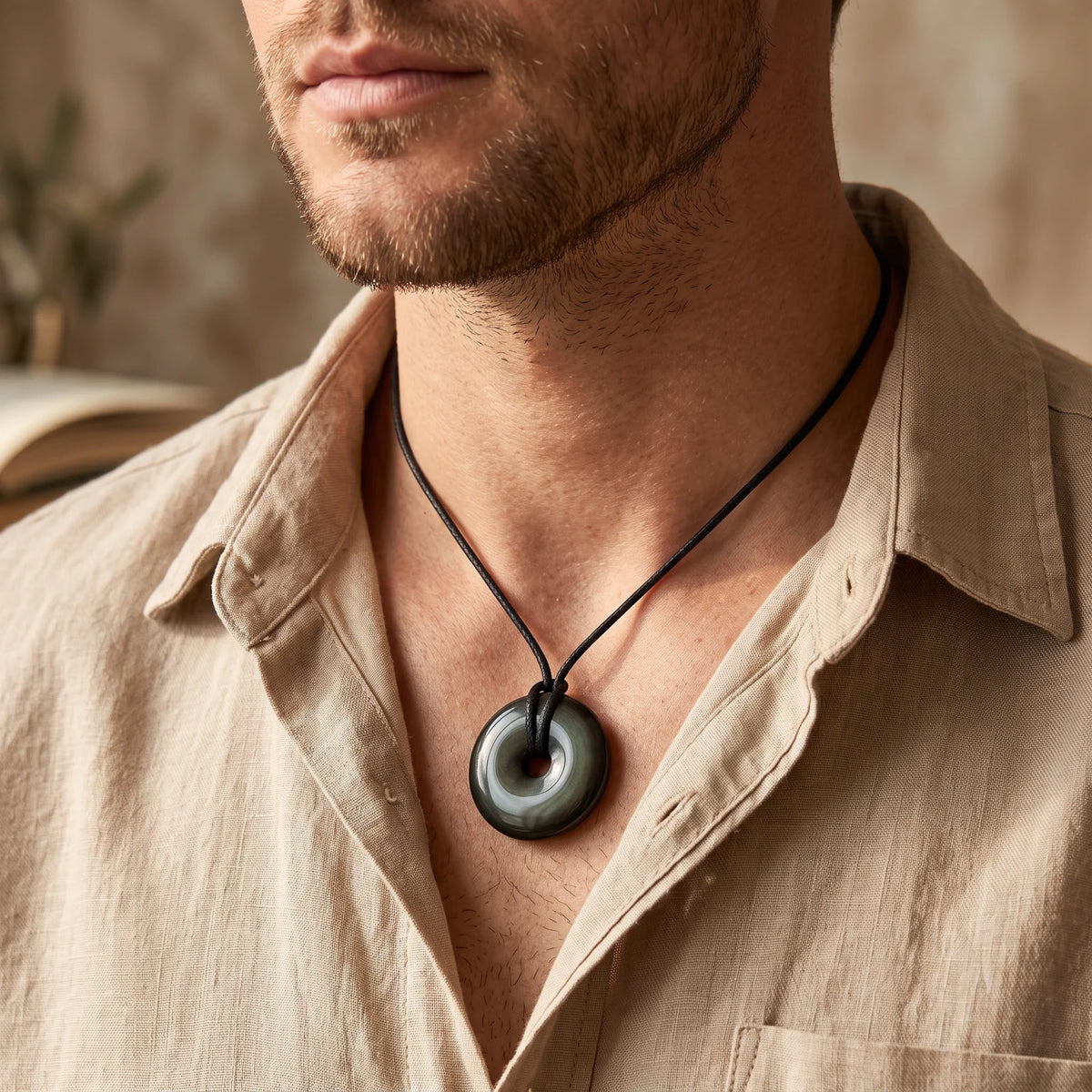 Collier homme pendentif donut en obsidienne œil céleste sur cordon noir