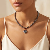 Collier Cœur Femme en Hématite, Pendentif Cœur Bombé et Perle Dorée