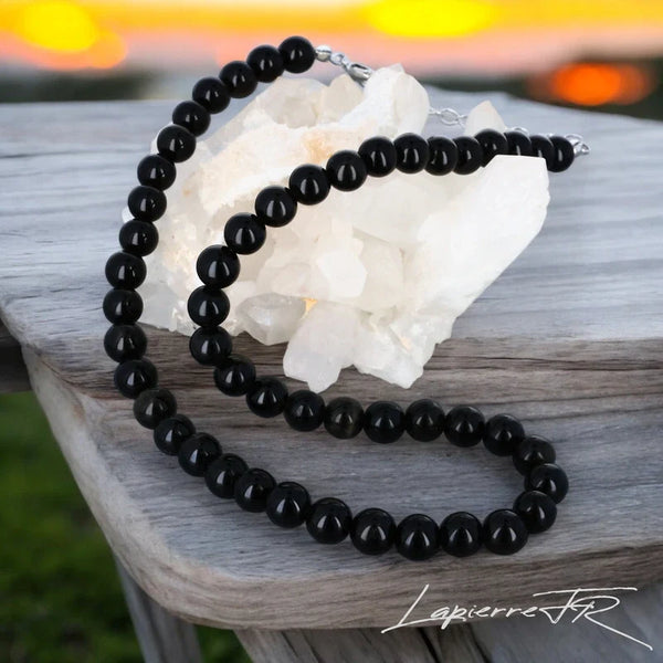 Collier avec pierre d’Obsidienne Dorée véritable, bijou en perles naturelles noires aux reflets dorés. Symbole de protection et de lucidité intérieure.
