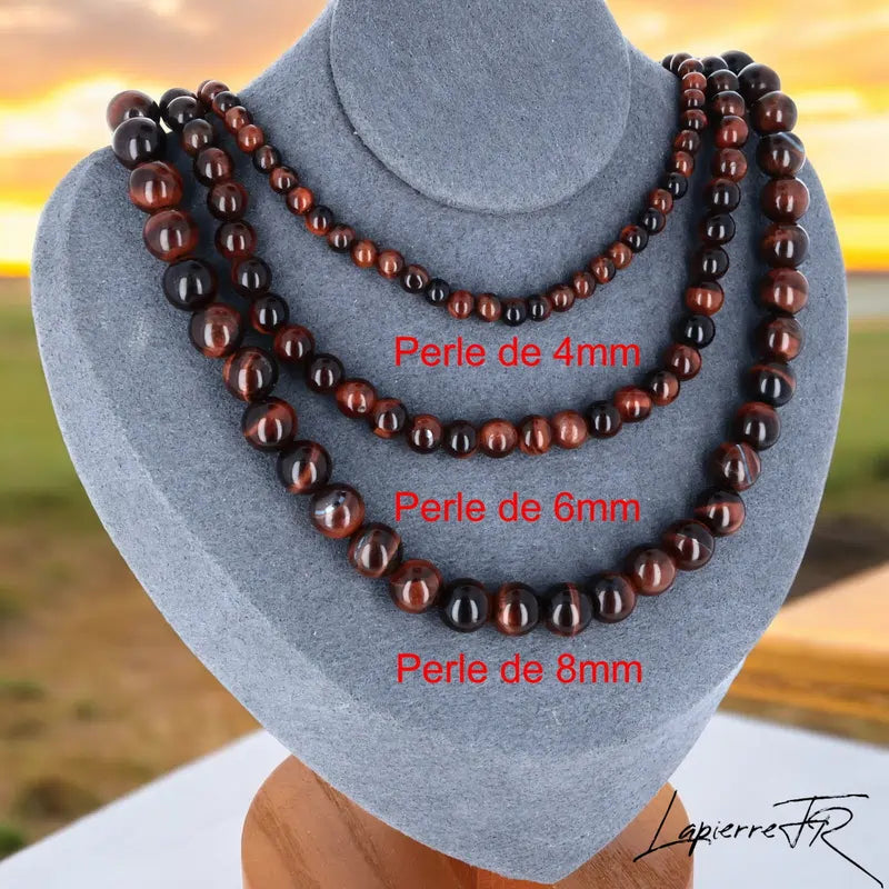 Collier Œil de Taureau en pierre naturelle, bijou de lithothérapie pour femme, perles rondes marron rouge profond, symbole de force et de courage.
