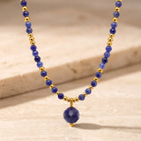Collier Sodalite PERLÉA®, Perles Bleues Facettées sur Acier Doré
