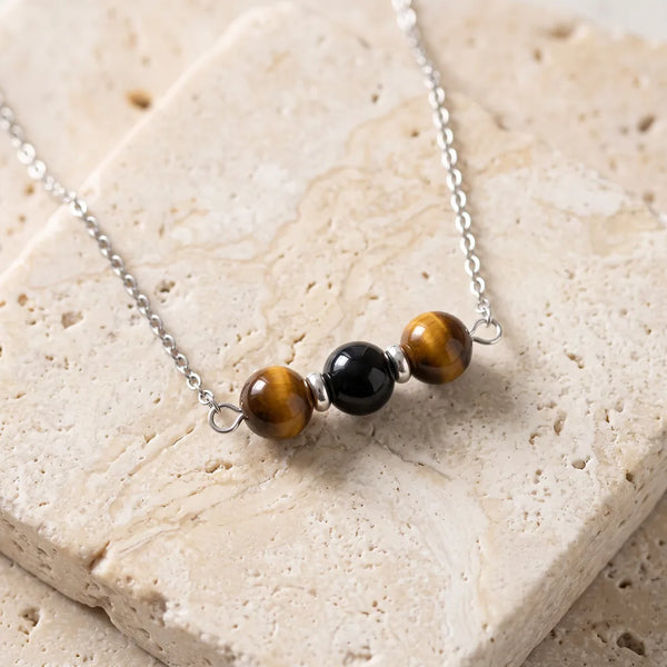 Collier pierre marron TRINA® en œil de tigre et onyx, trois perles sur chaîne argentée