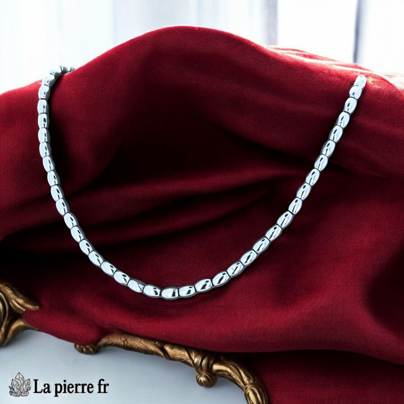 Détail des perles olive en hématite polie au gris métallique
