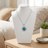 Collier Pendentif Soleil en Nacre Naturelle Bleue