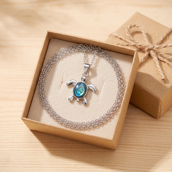 Collier tortue femme en nacre dans une boîte cadeau kraft, idée cadeau