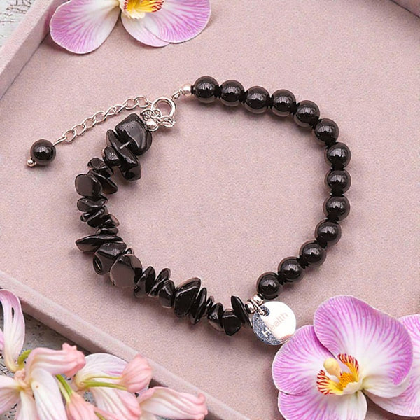 Détail du bracelet Obsidienne noire DUO® avec chaîne réglable en acier inoxydable